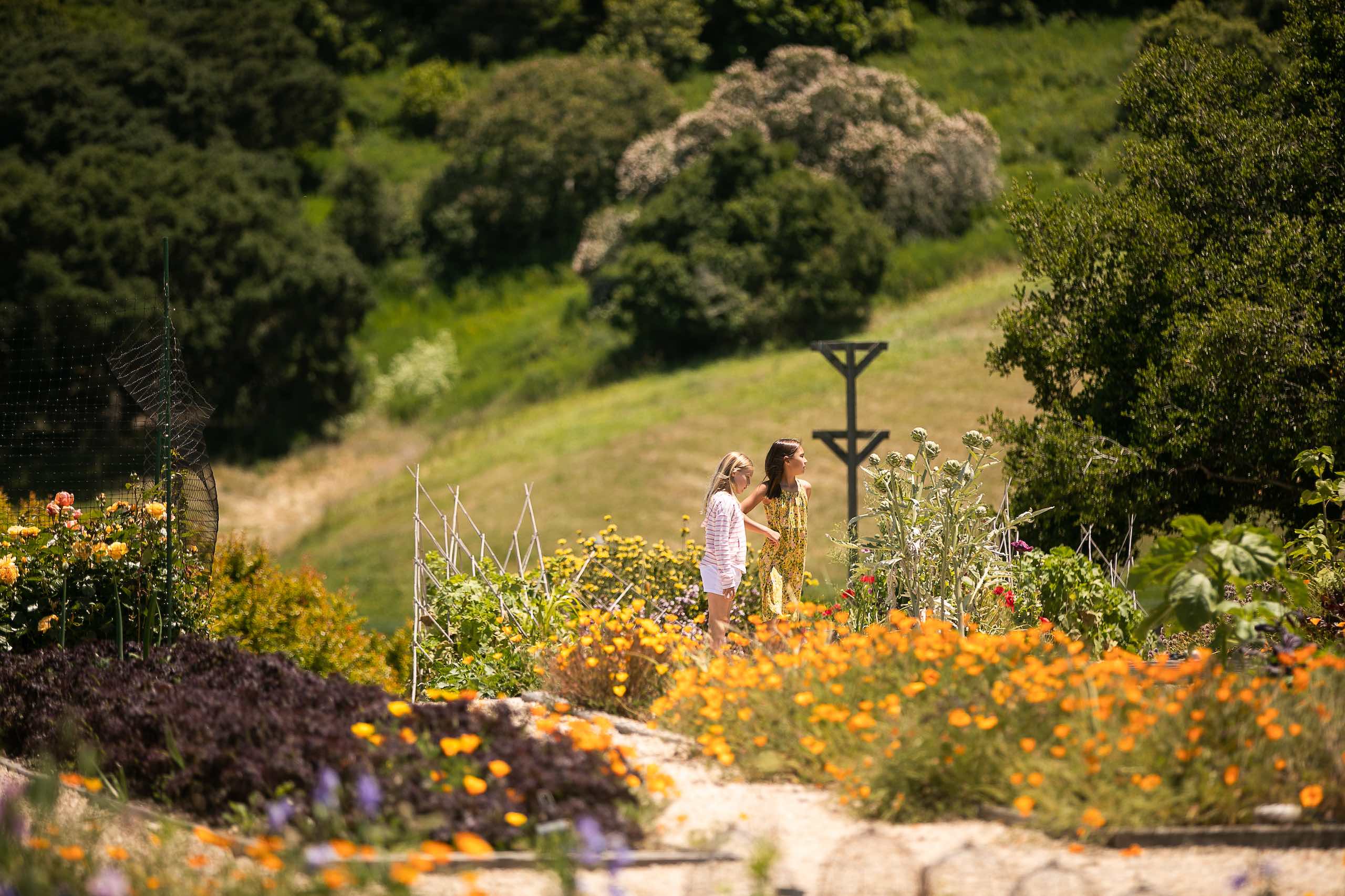 Two women in a garden at Carmel Valley Ranch