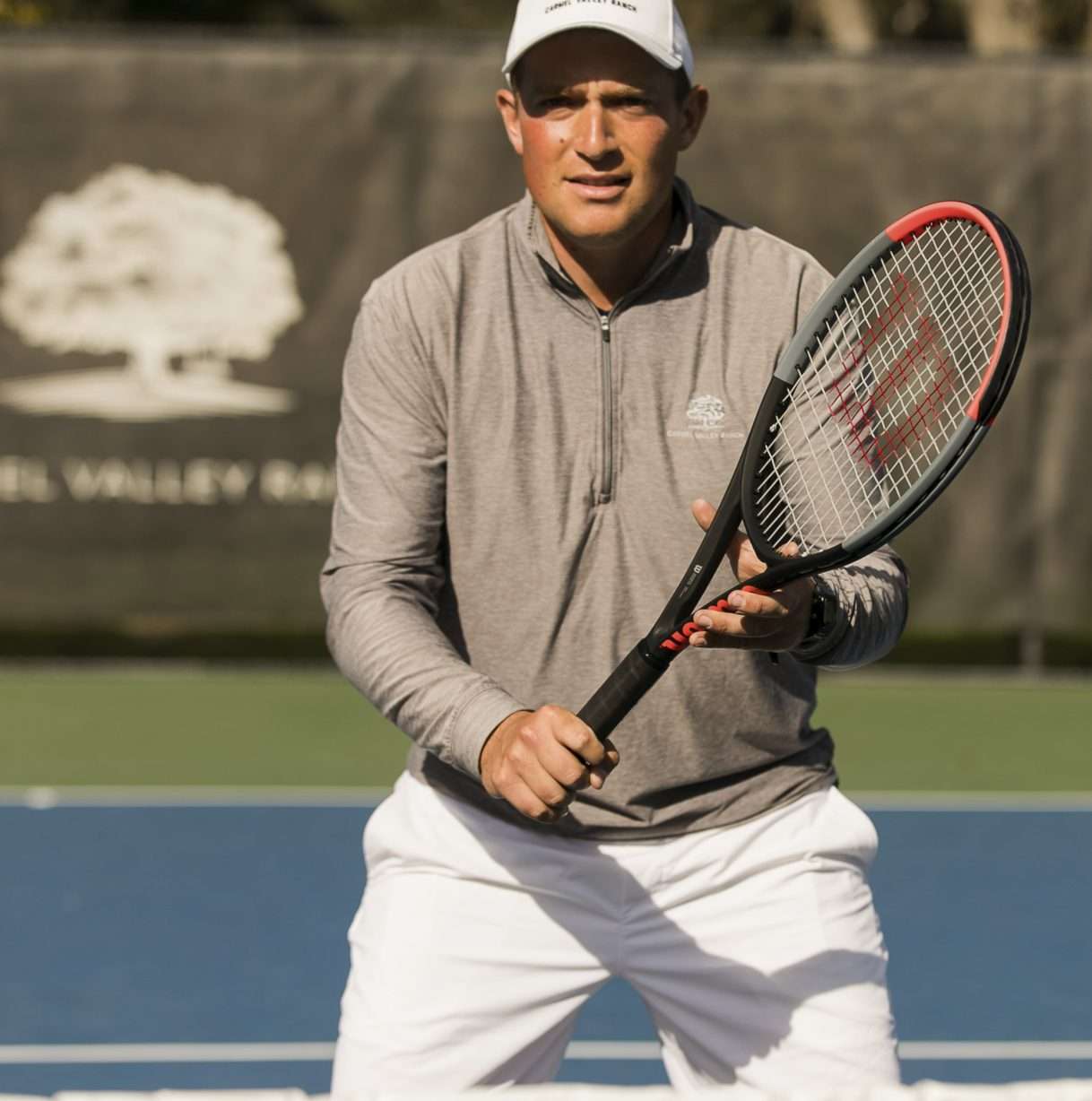 Man holding a tennis racquet